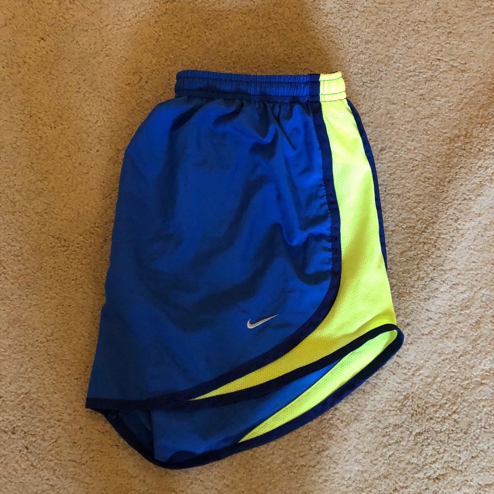 Nike blue and yellow running shorts